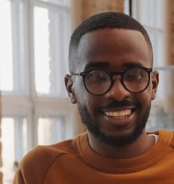 A smiling teaching assistant